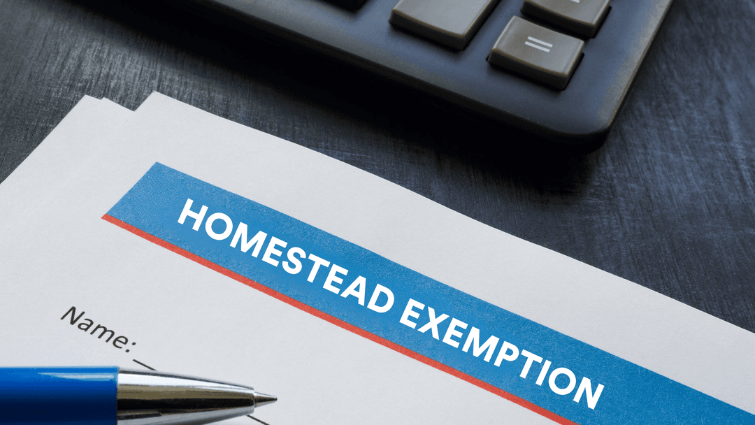 Filling out a homestead exemption form to lower Texas property taxes