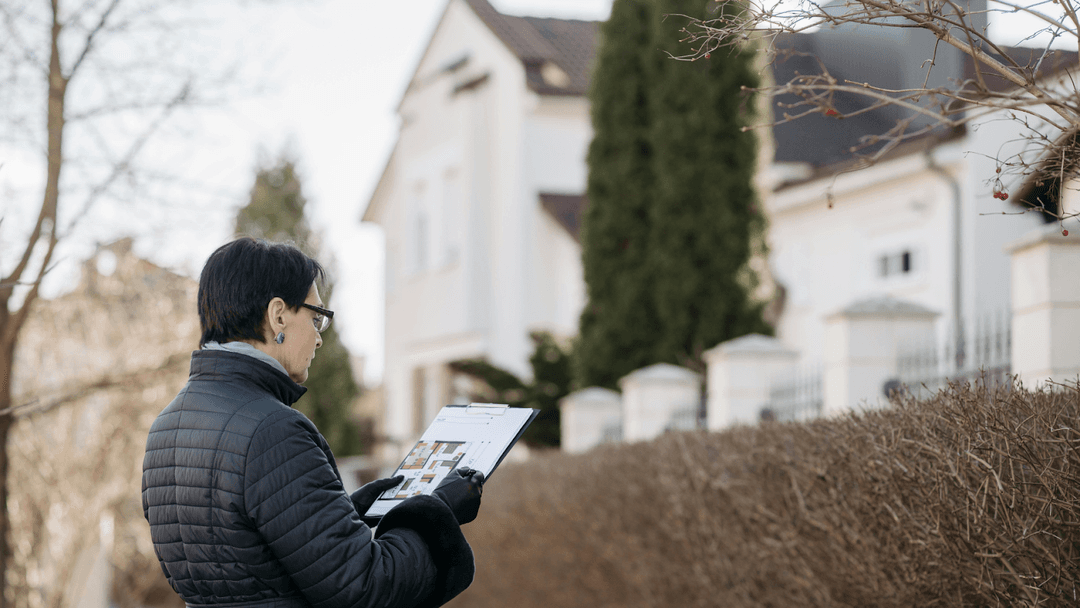 Woman Looking At Comparable Sales