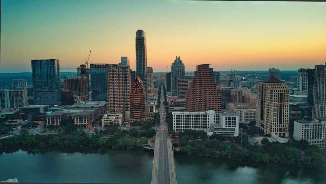 Sun rising over downtown Austin, TX, south of the Colorado River