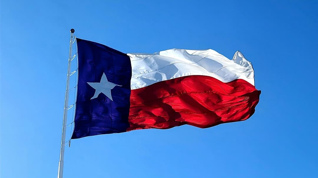 A Texas flag being flown after the user understands the Texas Property Tax Appeal Process