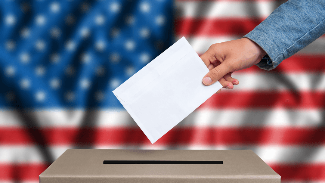 Hand casting vote on 2025 elections