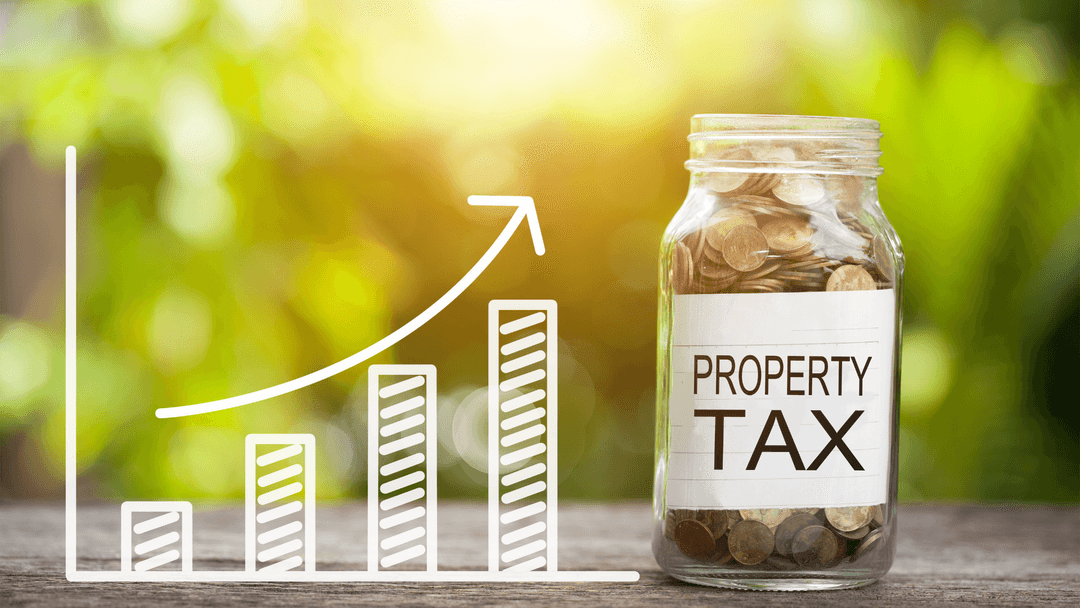 Glass jar filled with coins representing rising Texas property tax increases